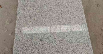 张家界芝麻白光面毛板