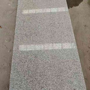 张家界芝麻白光面毛板