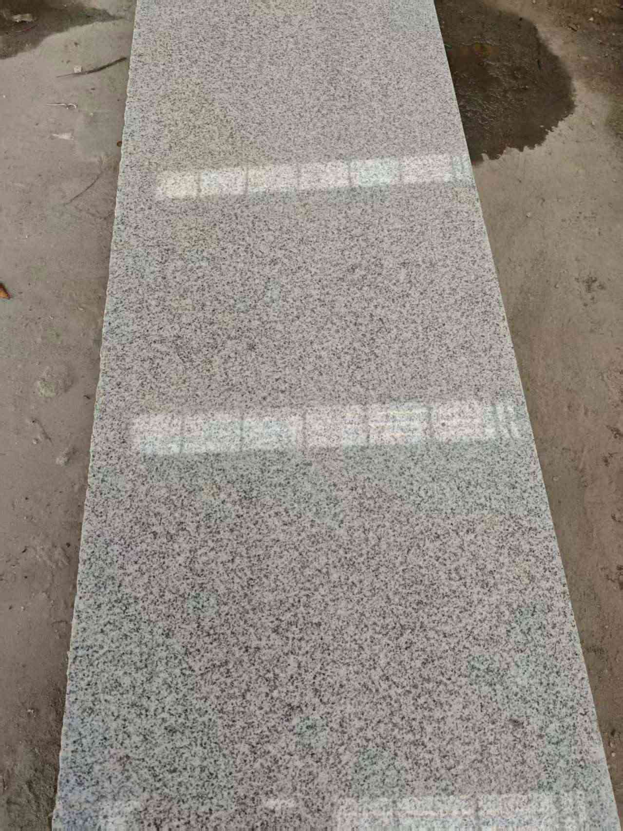 张家界芝麻白光面毛板